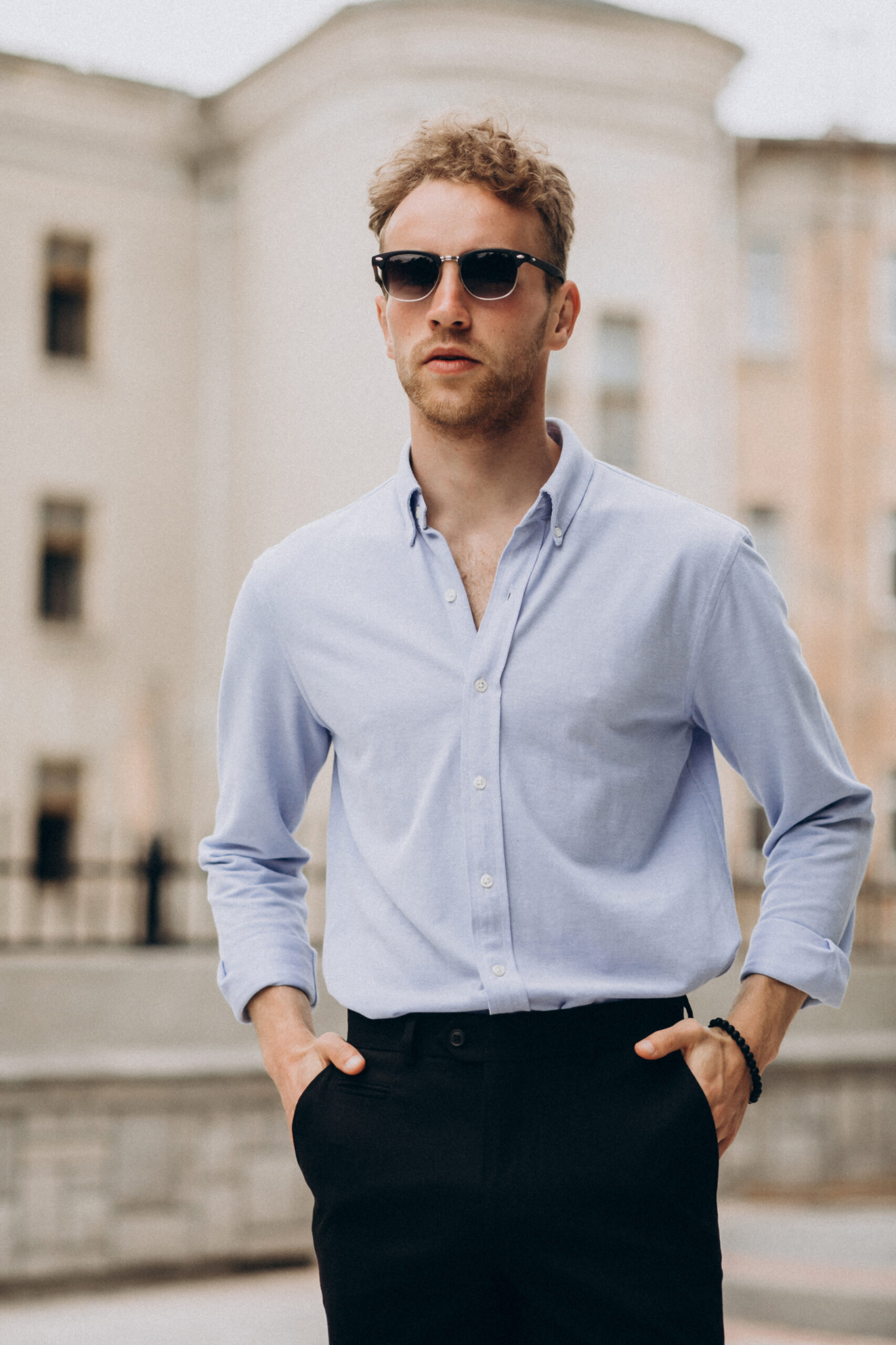 Stylish young handsome man in classy outfit Overhemd (lichtblauw)